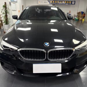 Black BMW 5 Series front view